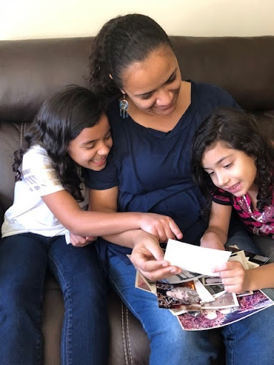 image of family looking at photos